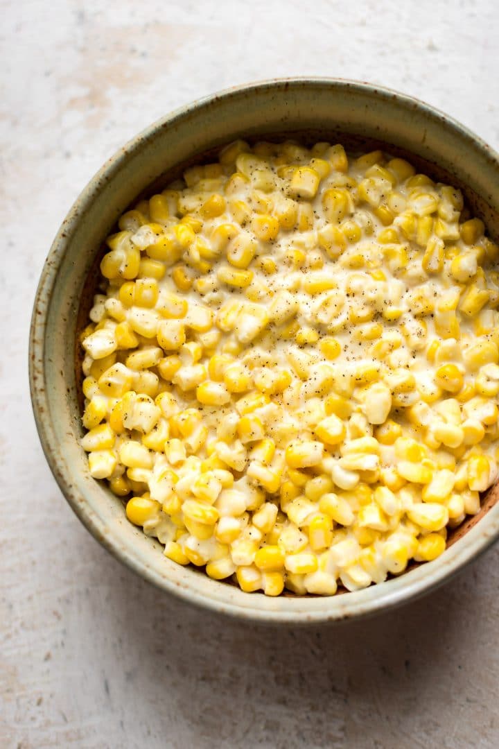 close-up of easy creamed corn in a beige bowl