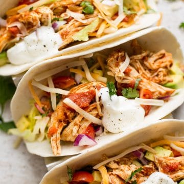 These Instant Pot chicken tacos are healthy and delicious. This easy family meal is ready in only 30 minutes, and it can be made with chicken breasts or thighs.