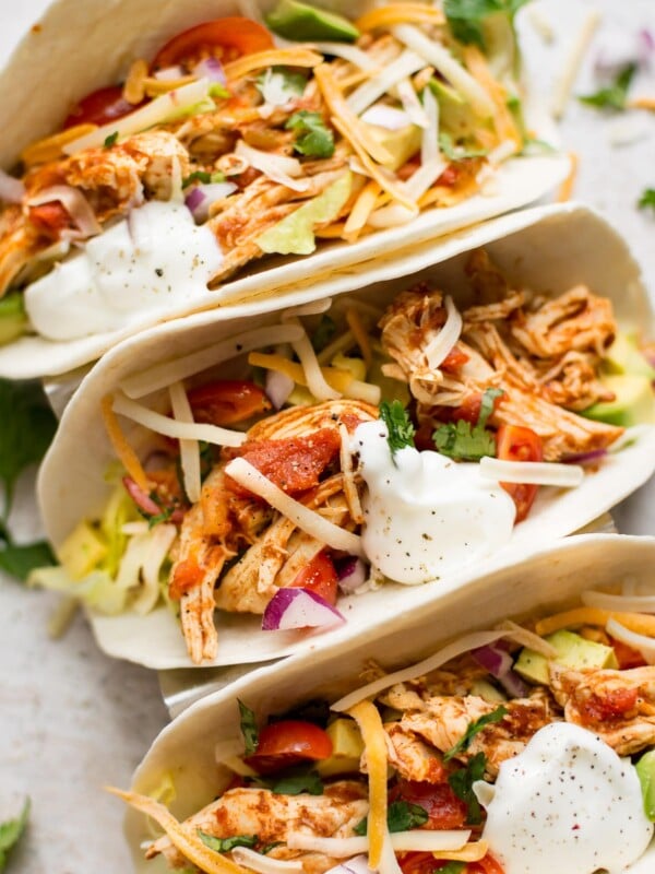 These Instant Pot chicken tacos are healthy and delicious. This easy family meal is ready in only 30 minutes, and it can be made with chicken breasts or thighs.