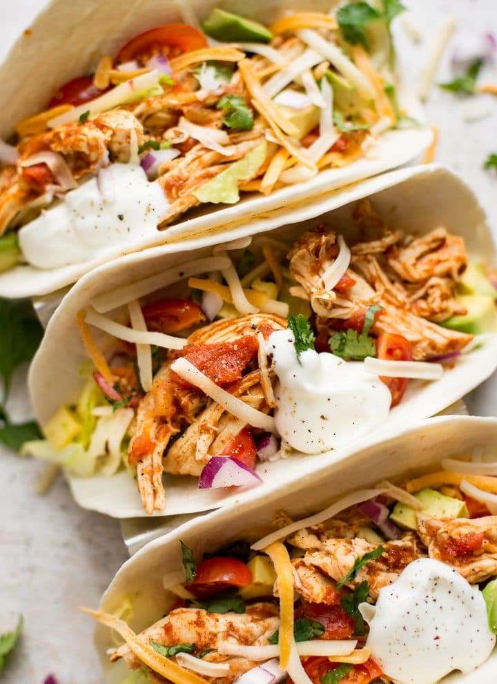 These Instant Pot chicken tacos are healthy and delicious. This easy family meal is ready in only 30 minutes, and it can be made with chicken breasts or thighs.