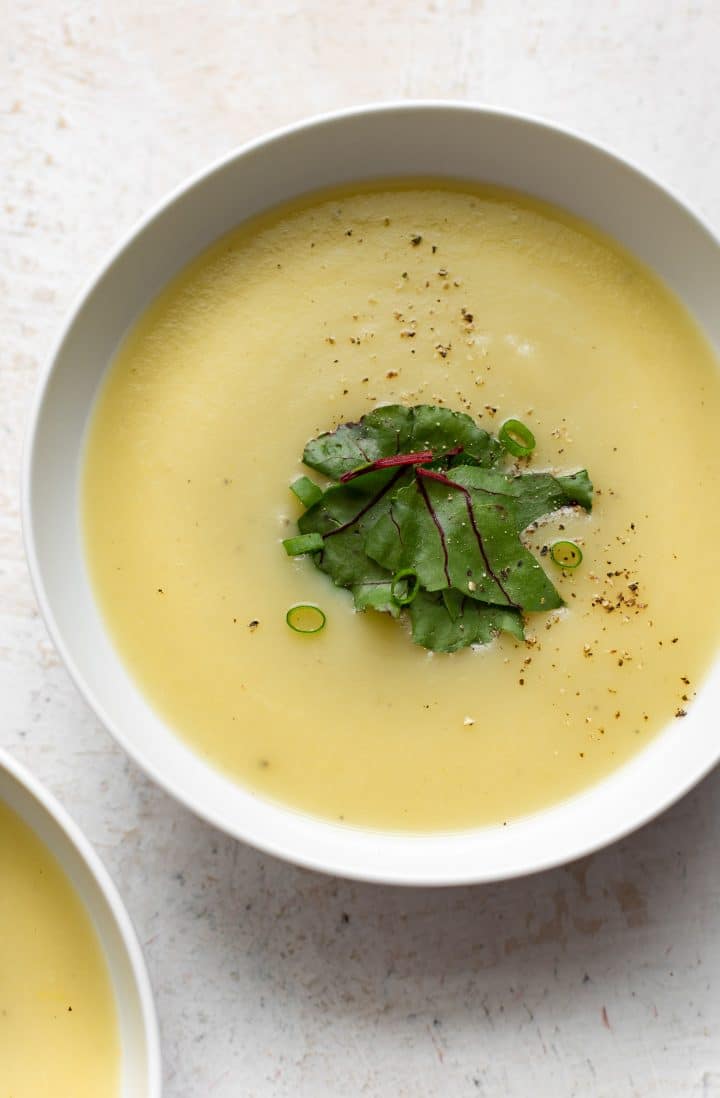 close-up of white bowl with easy and healthy Instant Pot potato and leek soup