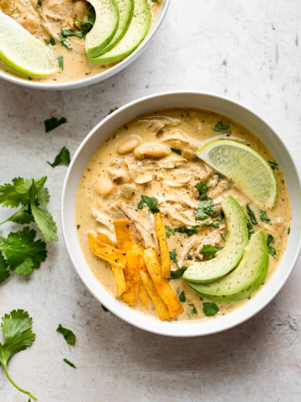 This creamy white chicken chili is easily made in your Instant Pot! Time to dust off the electric pressure cooker for this fabulous and flavorful recipe.
