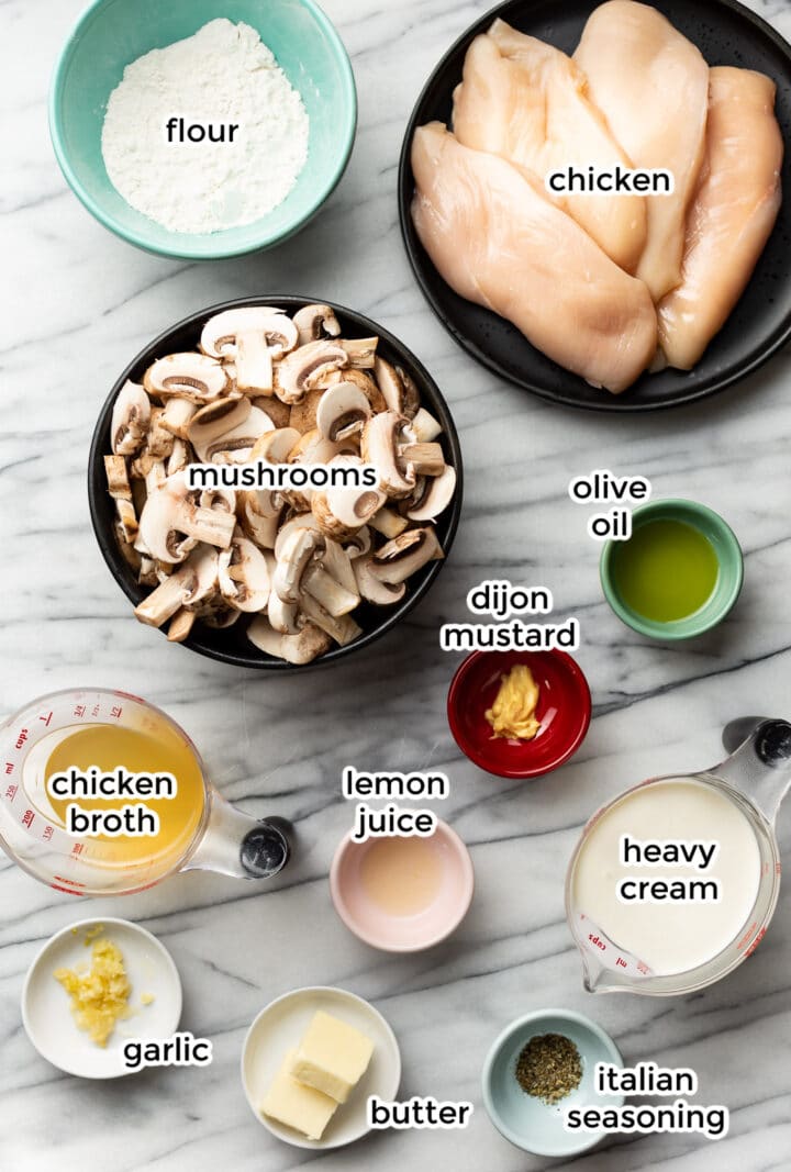 ingredients for creamy mushroom chicken in small bowls