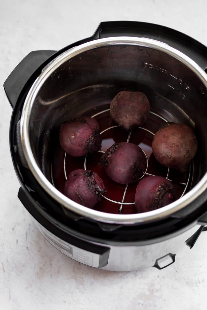 an Instant Pot filled with whole beets