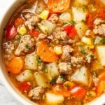 a bowl of sausage and vegetable soup