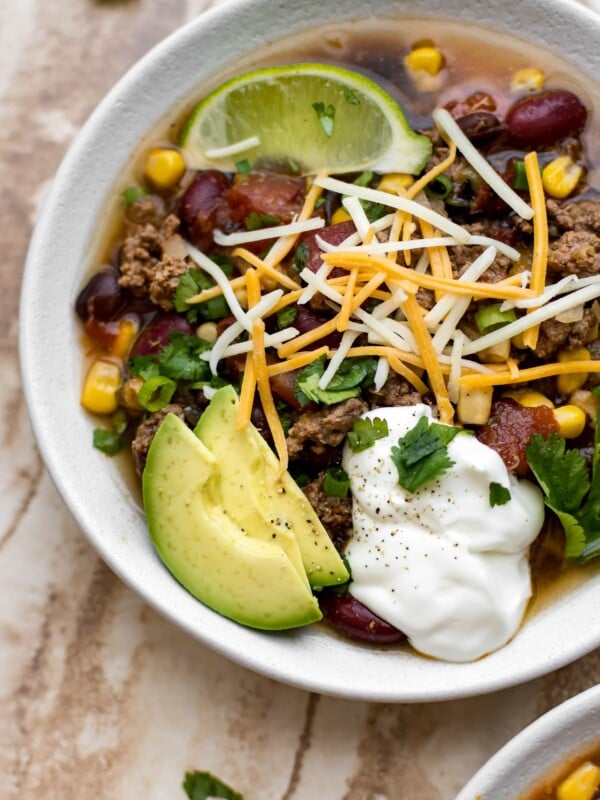 This slow cooker beef taco soup recipe is easy and delicious. Perfect for a family meal!