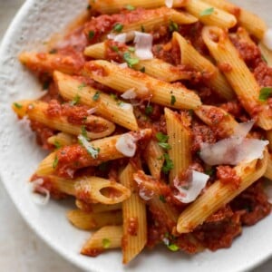 This easy Pasta Arrabiata is a traditional Italian pasta dish made of crushed tomatoes, garlic, olive oil, and red pepper flakes. 