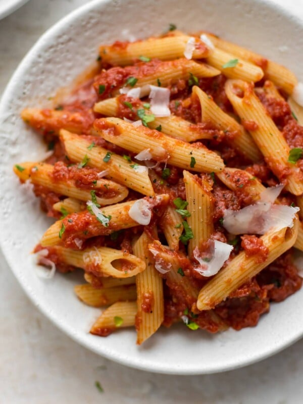 This easy Pasta Arrabiata is a traditional Italian pasta dish made of crushed tomatoes, garlic, olive oil, and red pepper flakes. 