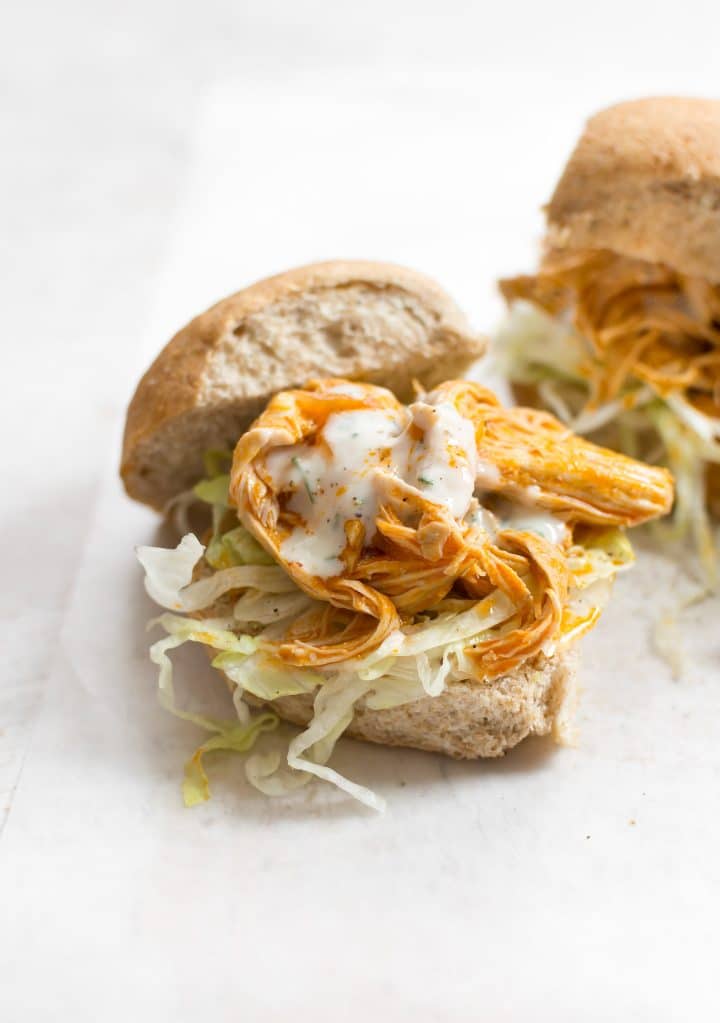 close-up of instant pot shredded buffalo chicken sliders