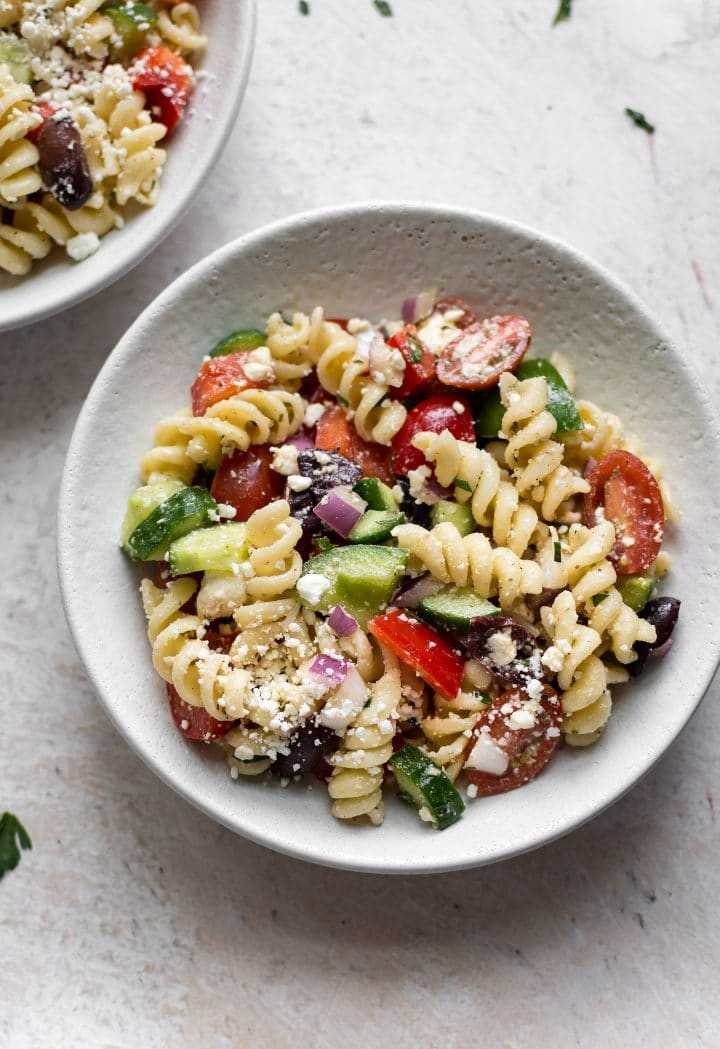 Greek pasta salad in two bowls