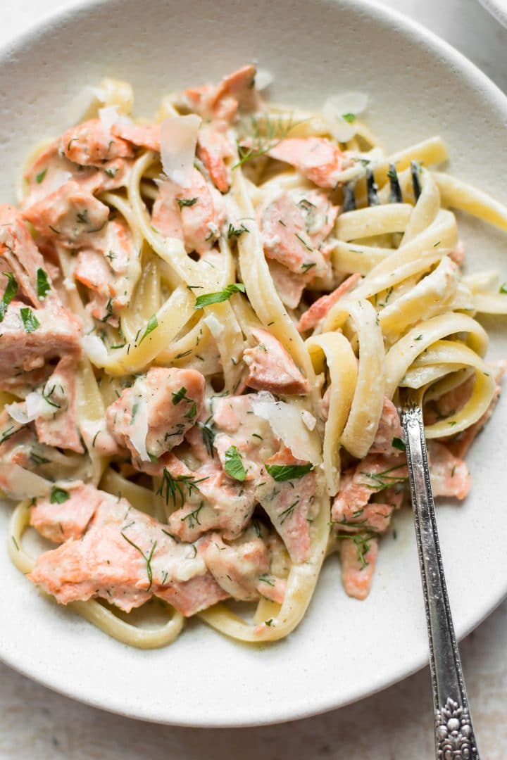 Closeup of salmon and pasta with lemon dill sauce