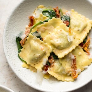 creamy tuscan ravioli in two bowls