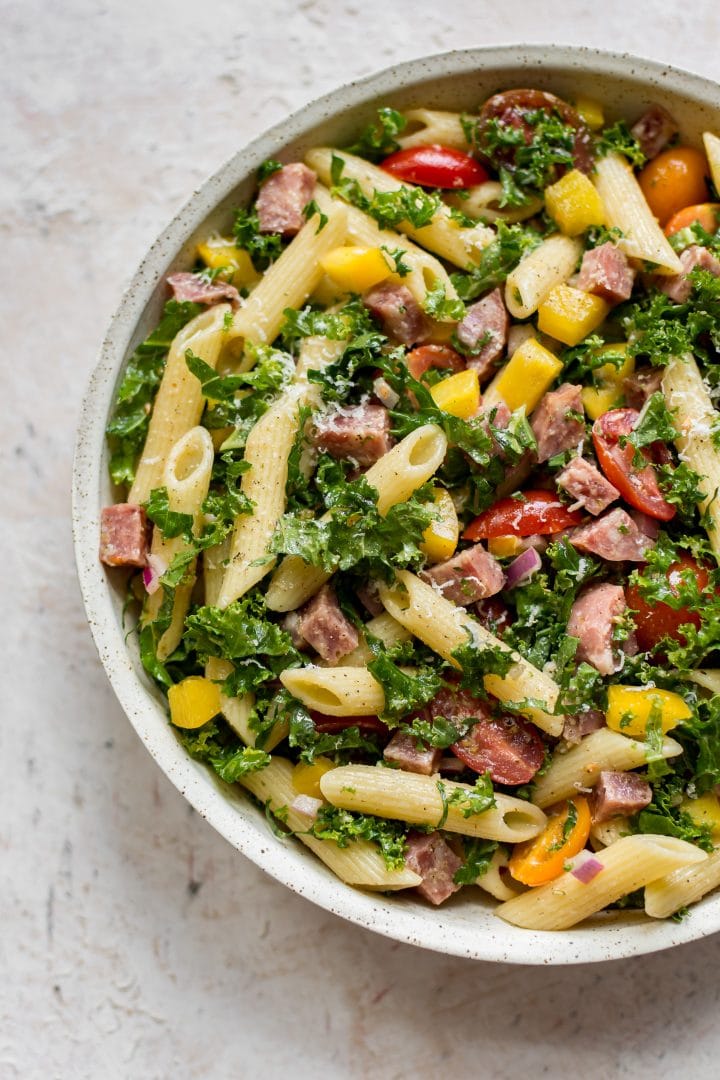 kale pasta salad in a serving bowl