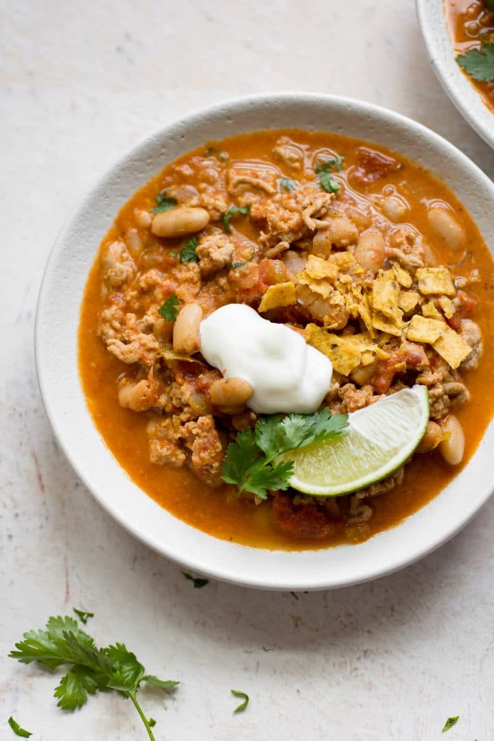 ground turkey white bean chili in two bowls