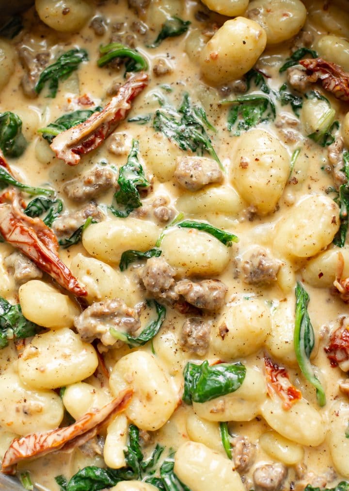close-up of creamy Tuscan sausage gnocchi 