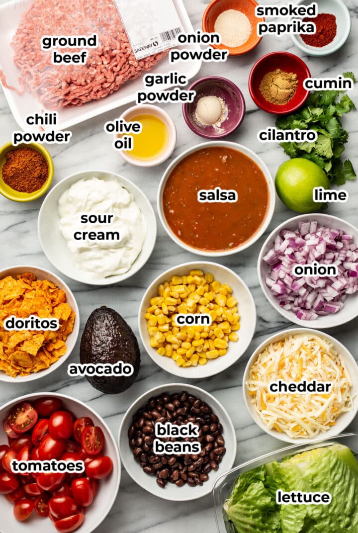 ingredients for taco salad in prep bowls