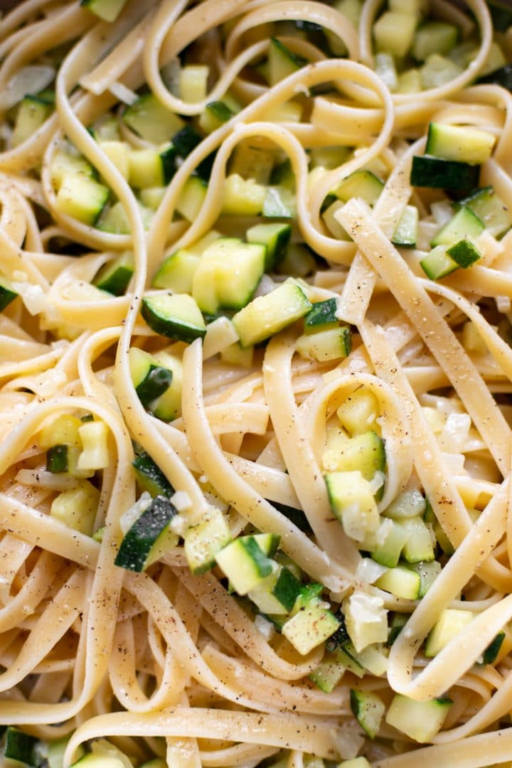 close-up of summer zucchini pasta sauce with fettuccine