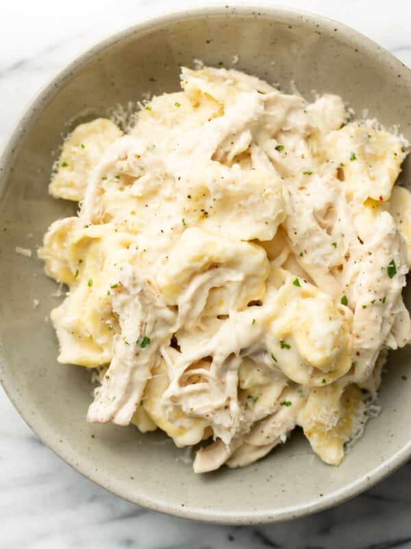 a bowl with chicken tortellini alfredo