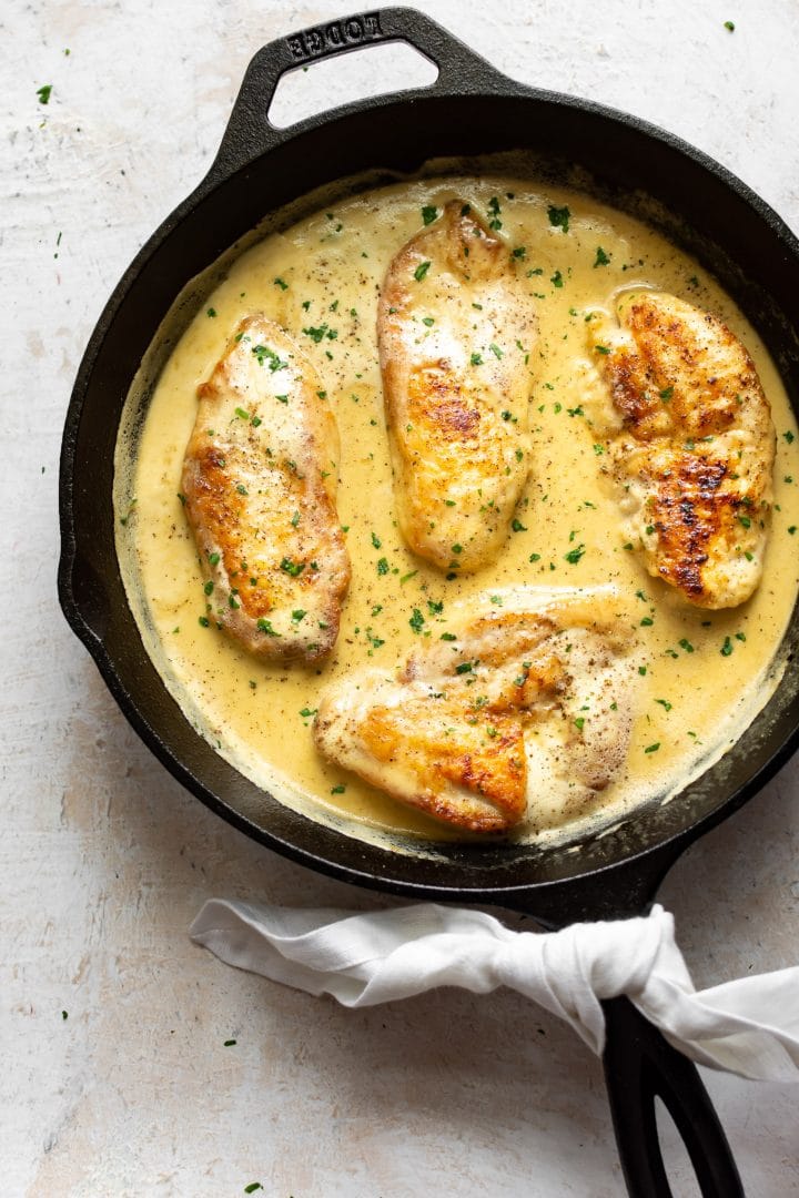 honey mustard chicken breasts in a cast iron skillet