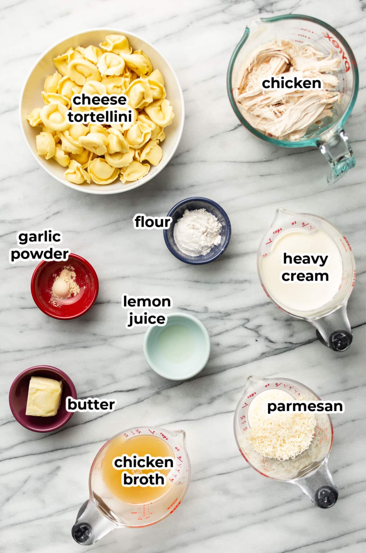 ingredients for chicken tortellini alfredo in prep bowls