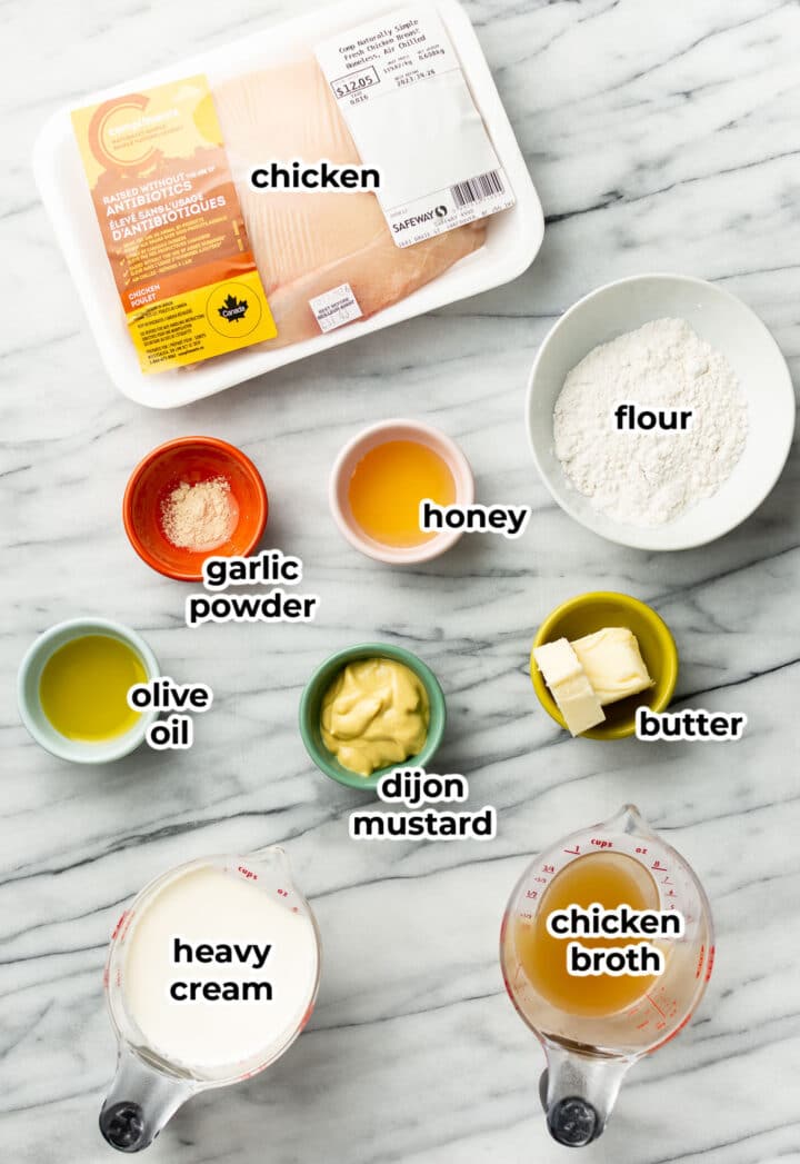 ingredients for creamy honey mustard chicken in prep bowls