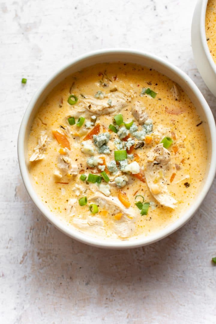 buffalo chicken wing soup with cream cheese in two bowls