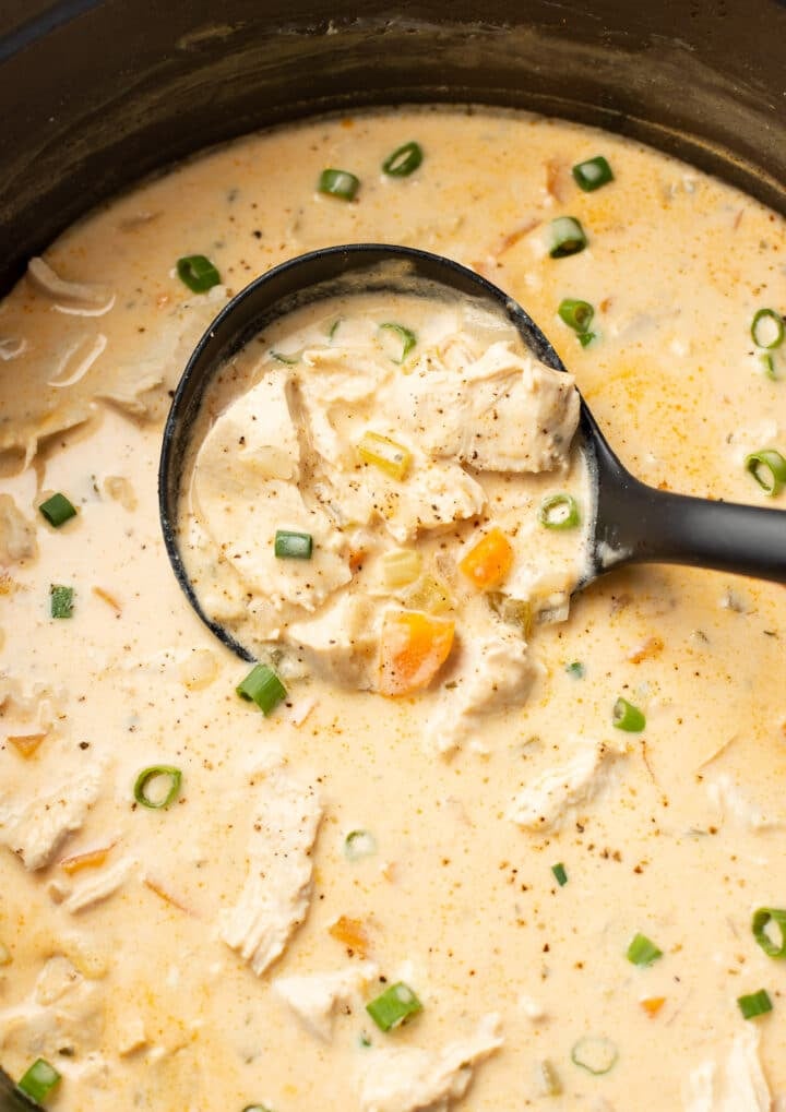 a ladle with buffalo chicken soup