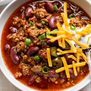 close-up of beef chili in a white bowl