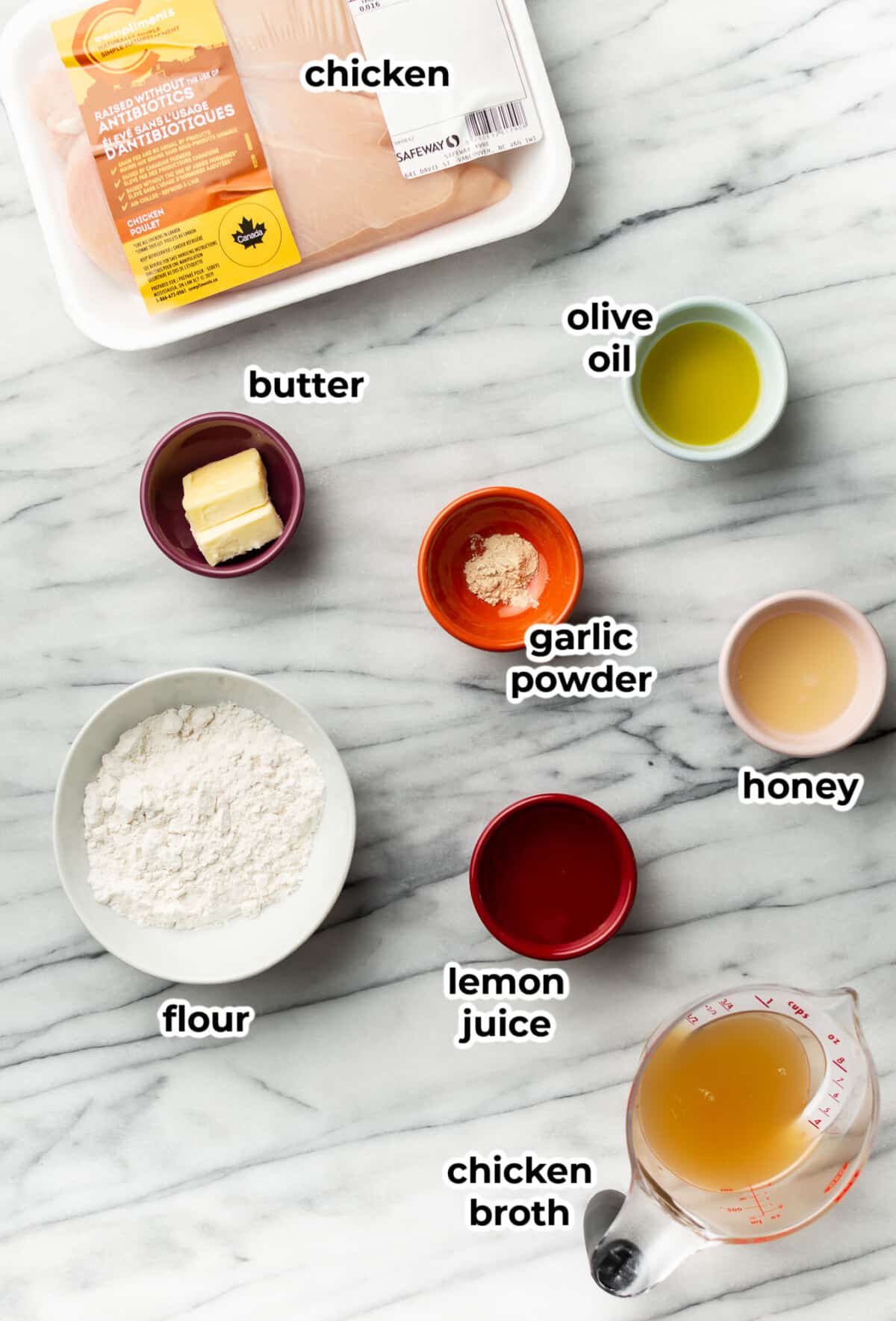 ingredients for honey lemon chicken in prep bowls