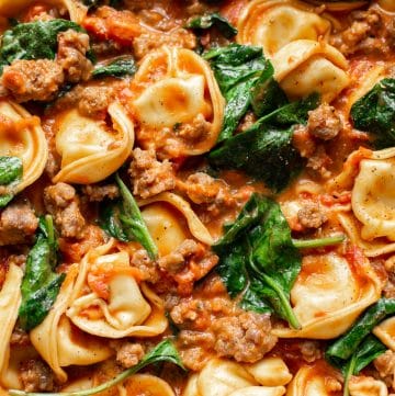 close-up of tortellini with spinach and sausage