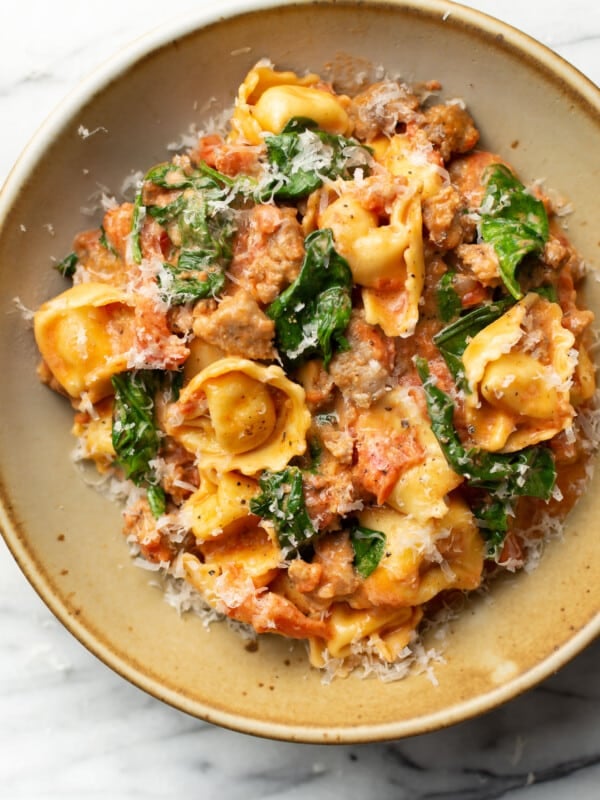 a bowl of italian sausage tortellini