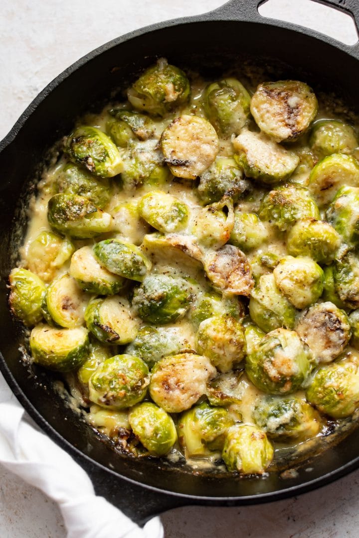 creamy Brussels sprouts gratin in a skillet