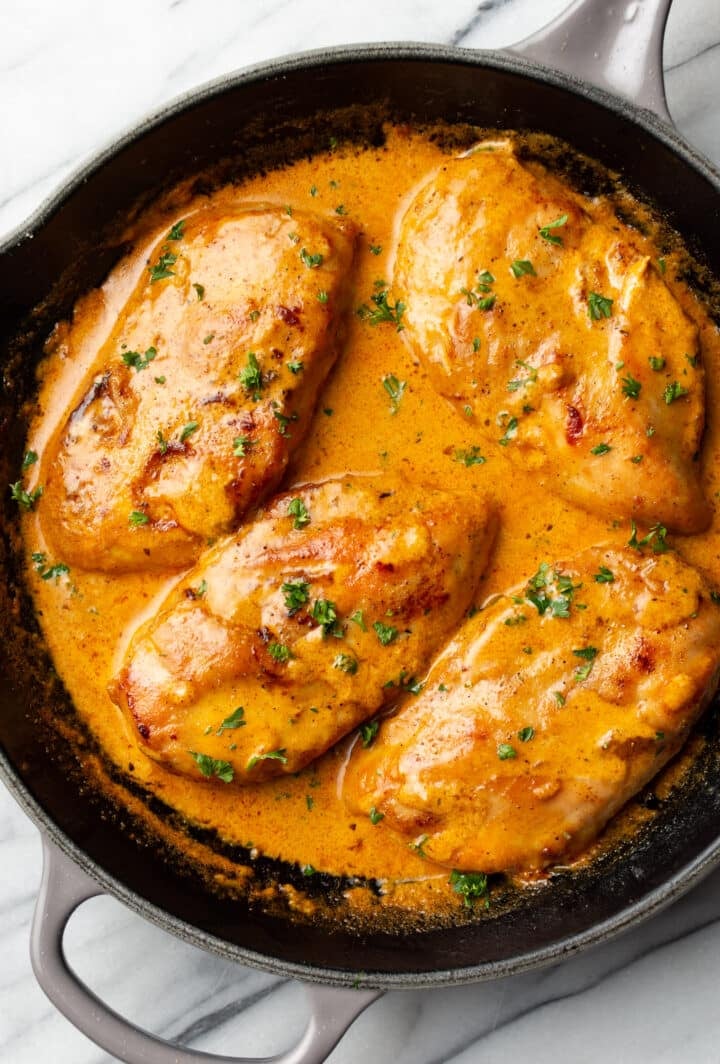 a skillet with chicken lazone