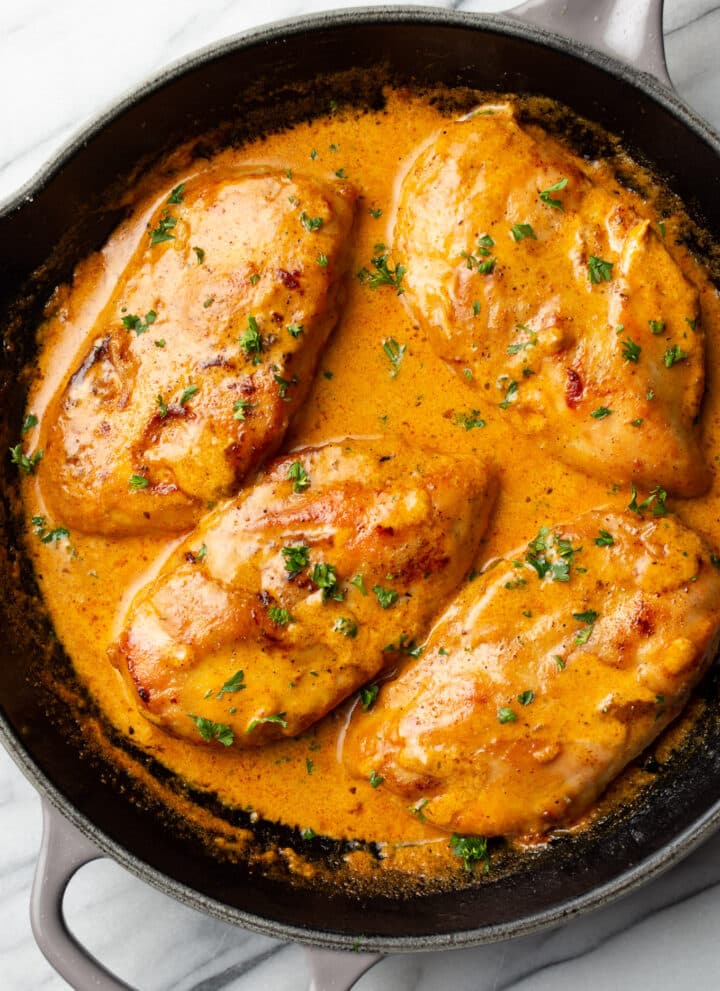 a skillet with chicken lazone