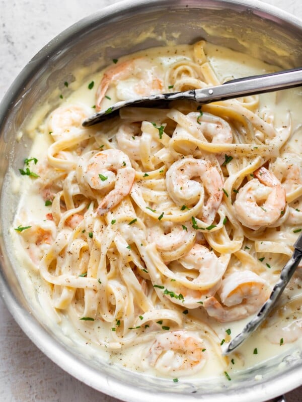 creamy shrimp alfredo pasta in a skillet