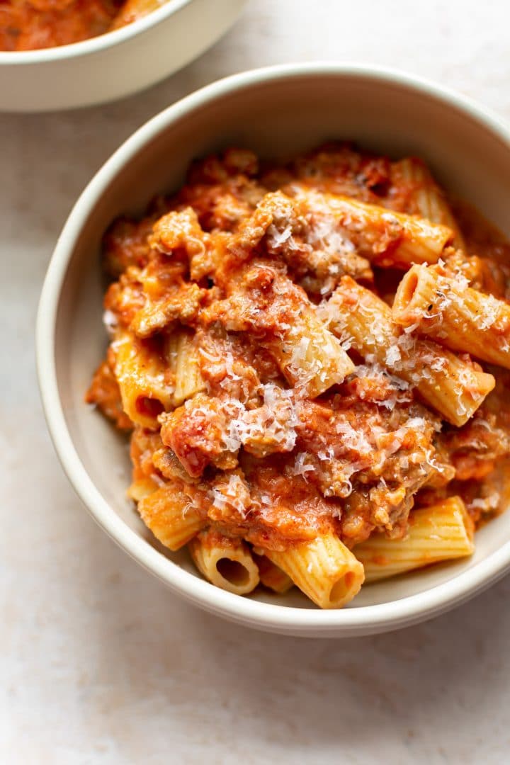 Italian sausage and rigatoni pasta in two bowls