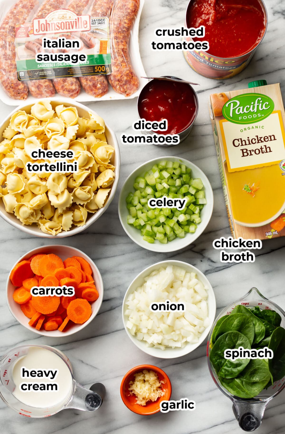 ingredients for crockpot tortellini sausage soup in prep bowls