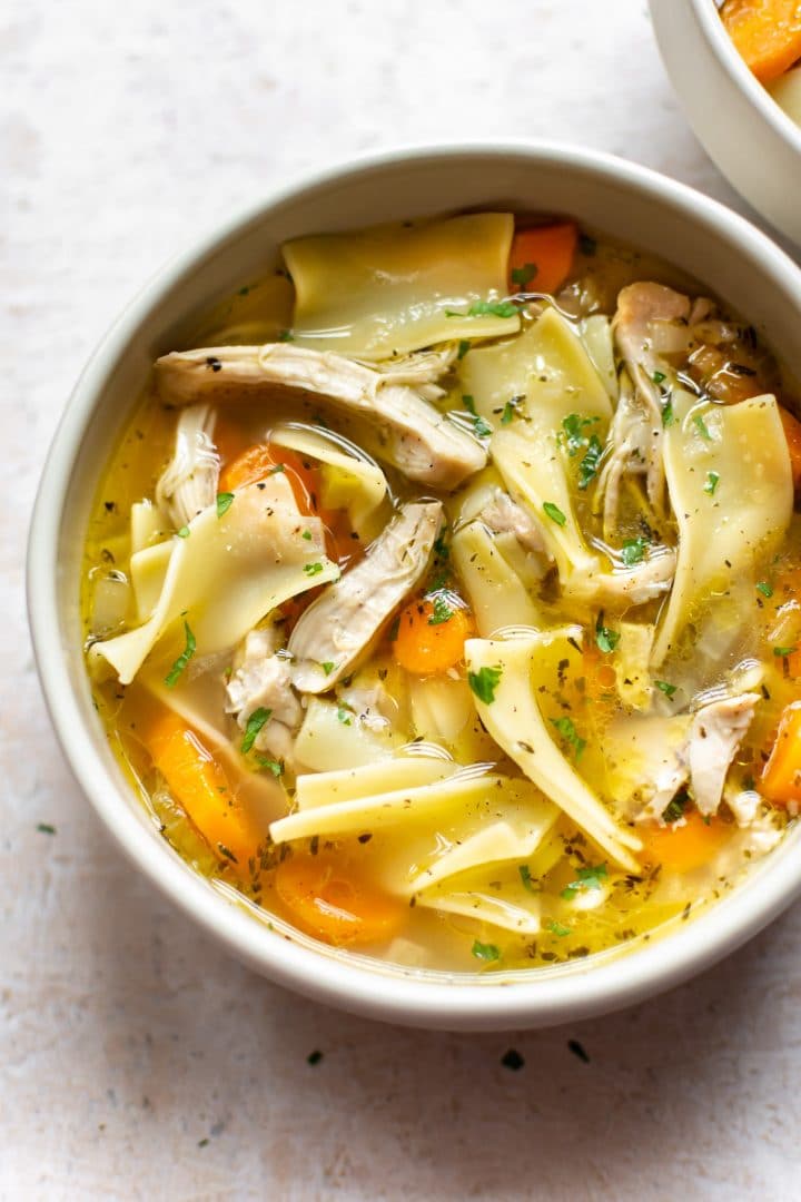 easy Instant Pot chicken noodle soup in a white bowl