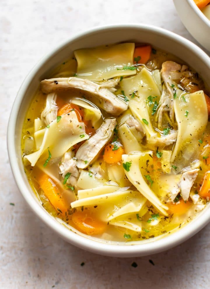 easy Instant Pot chicken noodle soup in a white bowl