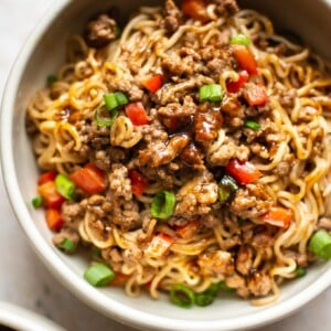 ground beef and ramen noodles in two bowls