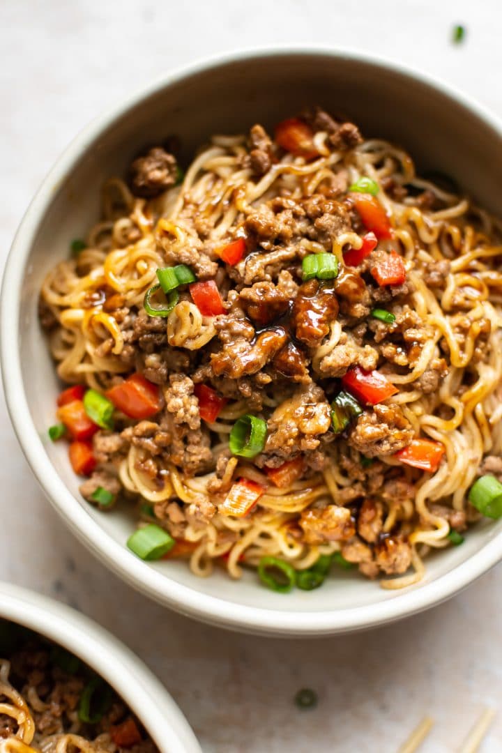 ground beef and ramen noodles in two bowls