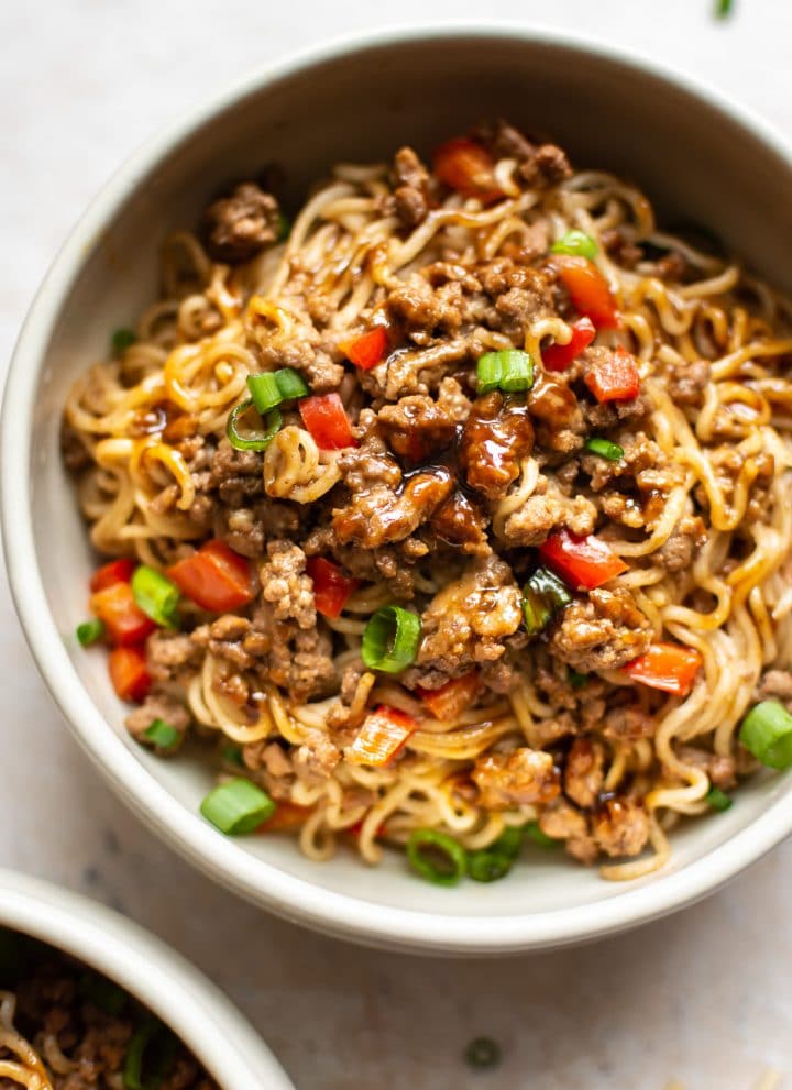 ground beef and ramen noodles in two bowls