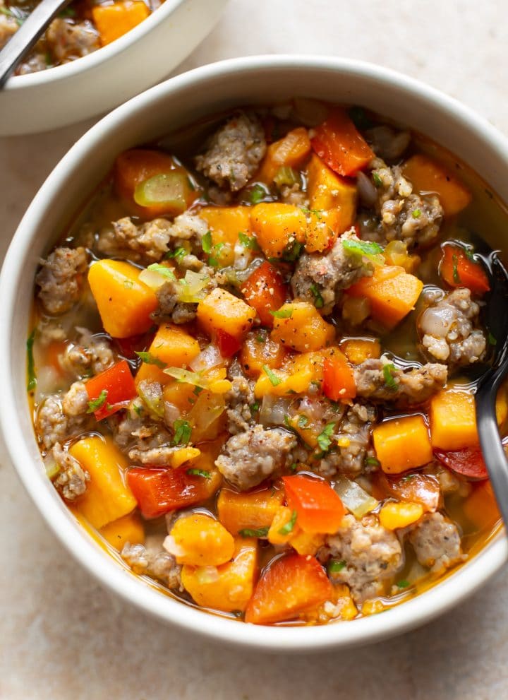 sausage sweet potato soup in two bowls
