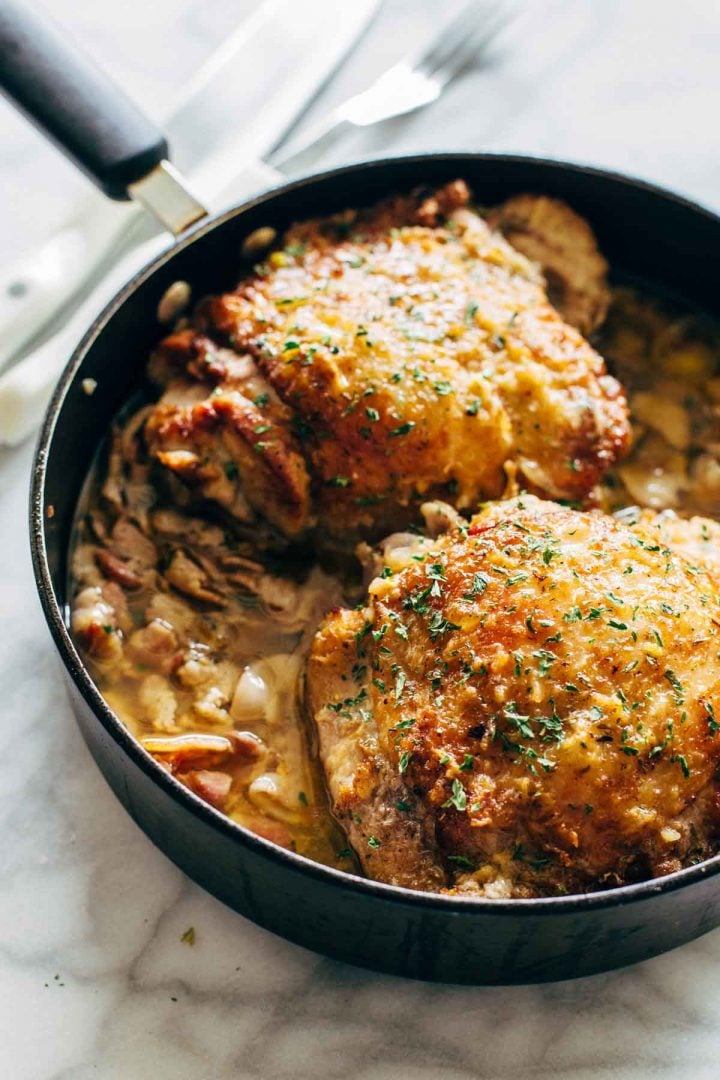turkey in a skillet with bacon and white wine sauce