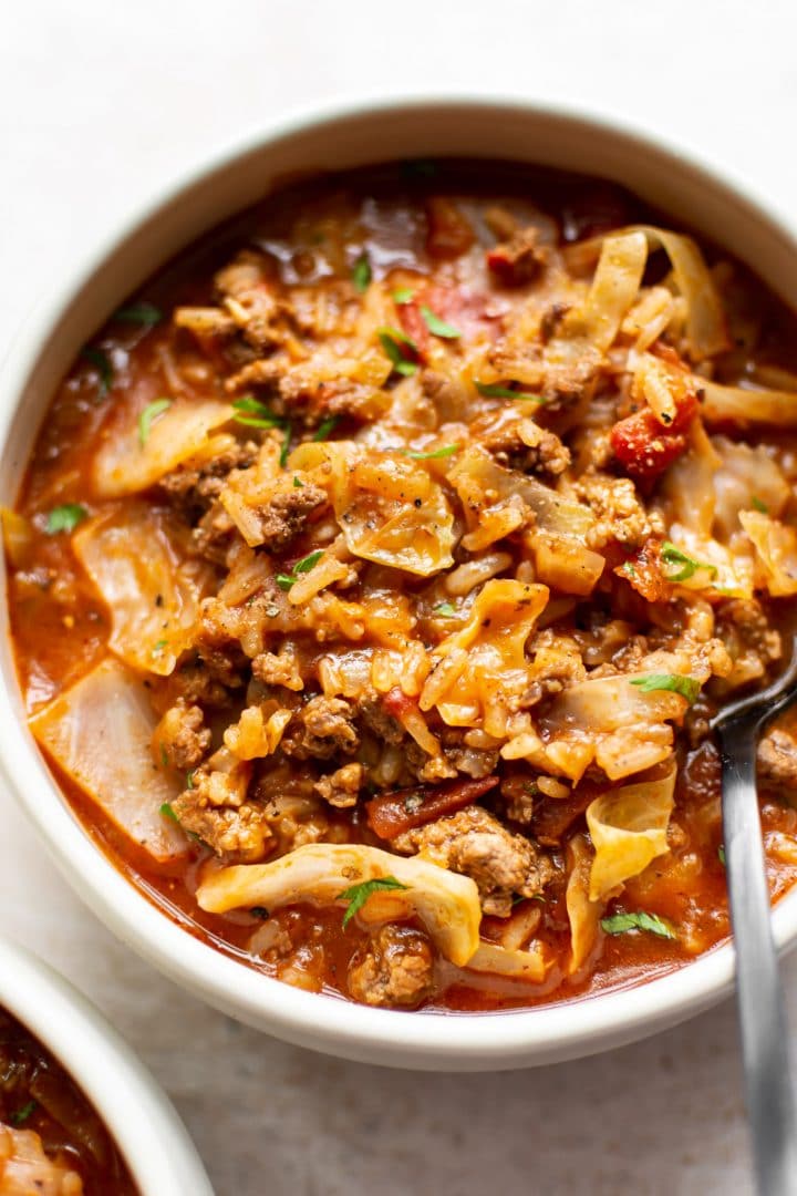 stuffed cabbage roll soup in a bowl (close-up)