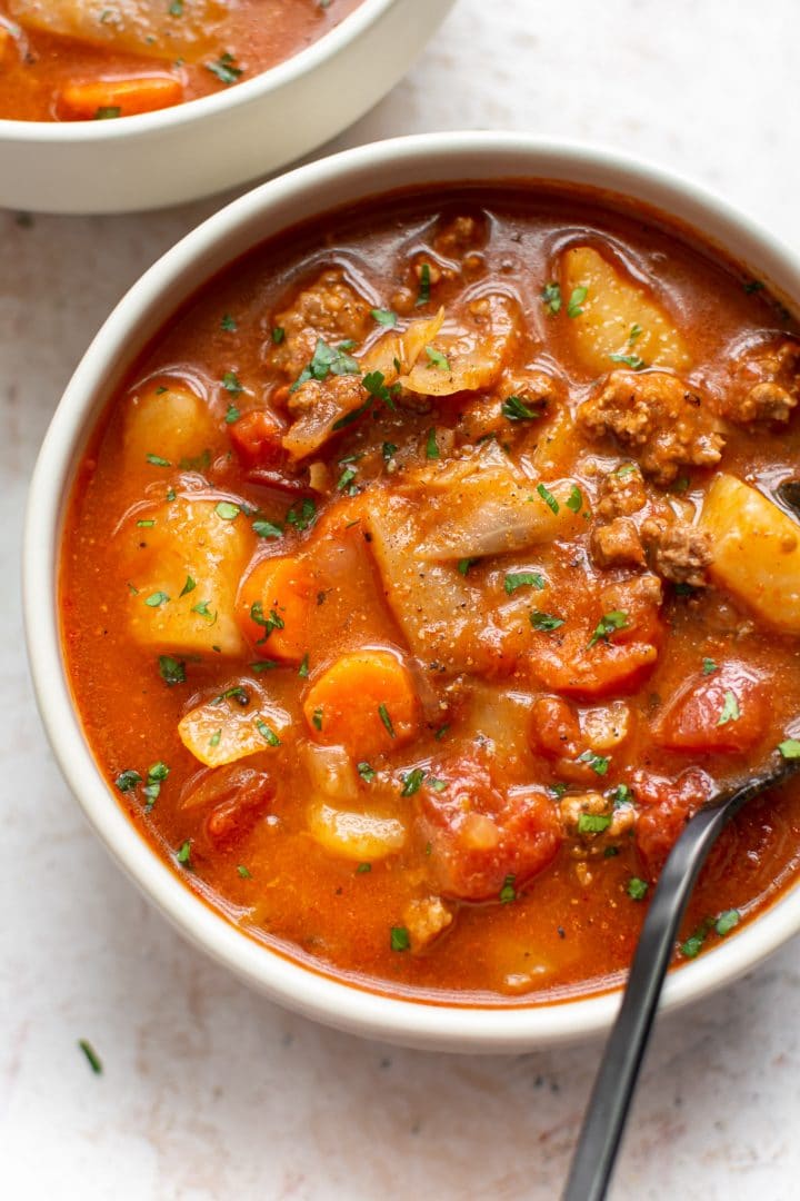 close-up of Instant Pot beef and cabbage soup in a bowl