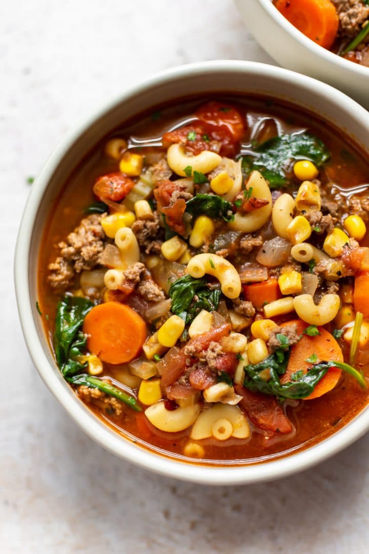 simple macaroni soup in two bowls