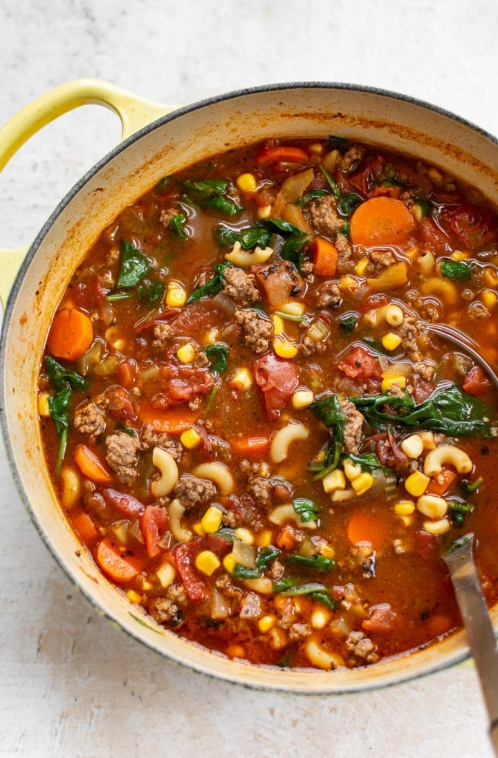 hamburger macaroni soup in a yellow pot