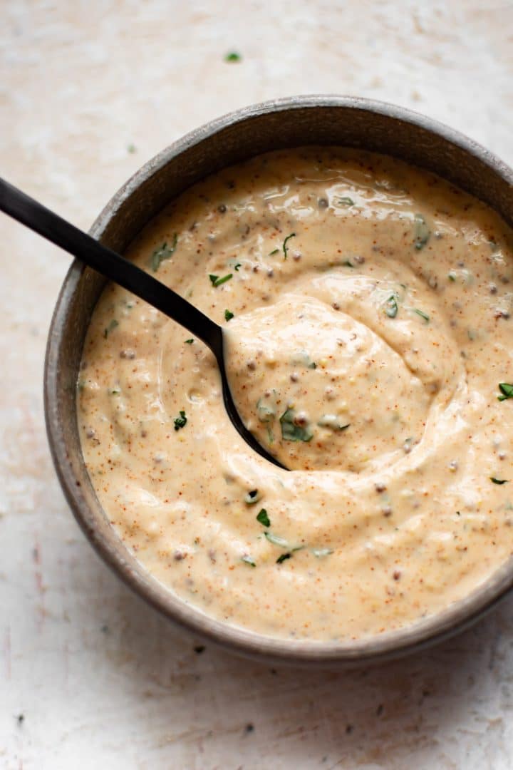 remoulade sauce being stirred in a bowl