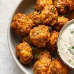 close-up of Bisquick sausage balls with remoulade dipping sauce